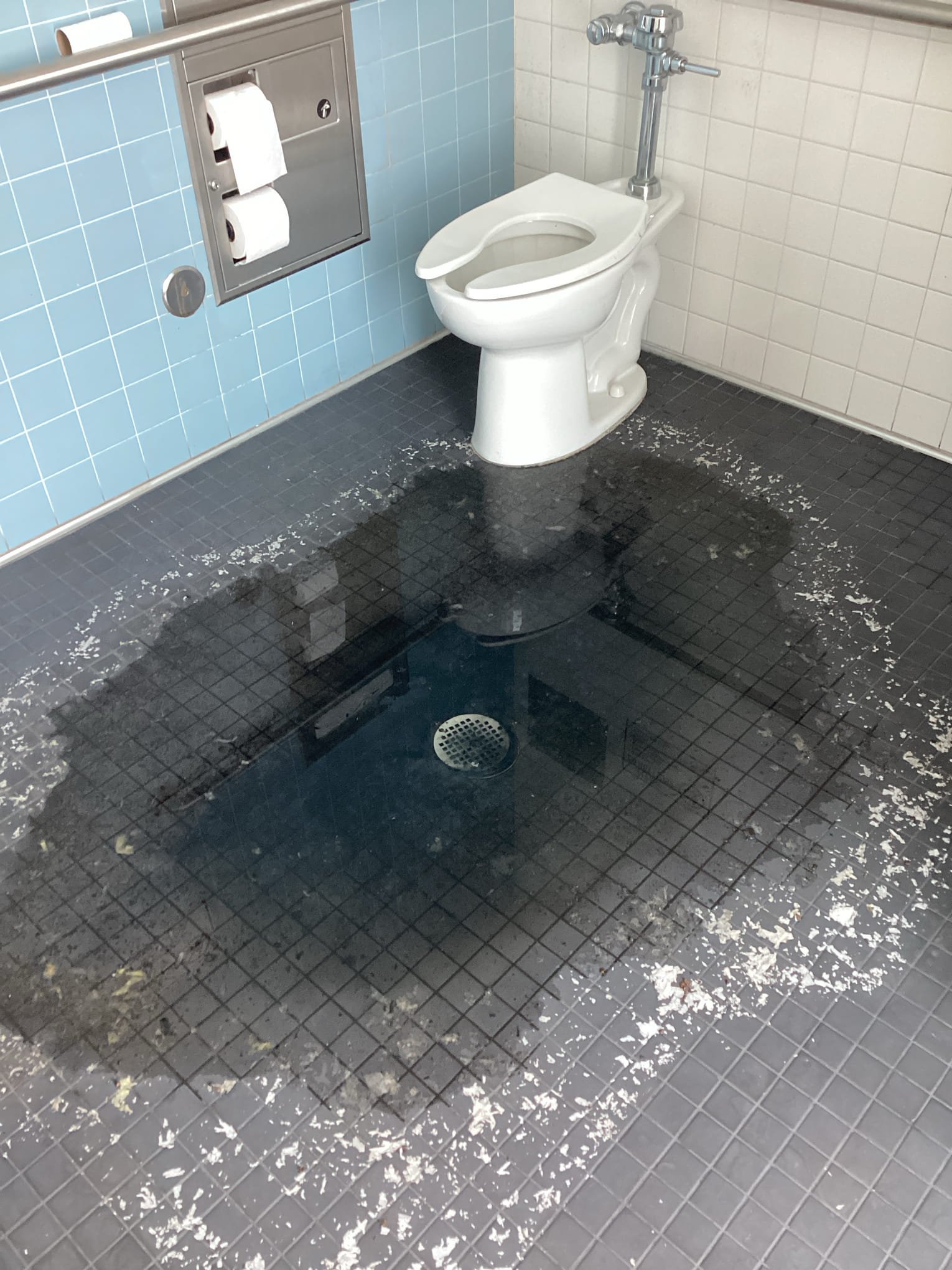 Clogged commercial floor drain before hydrojetting